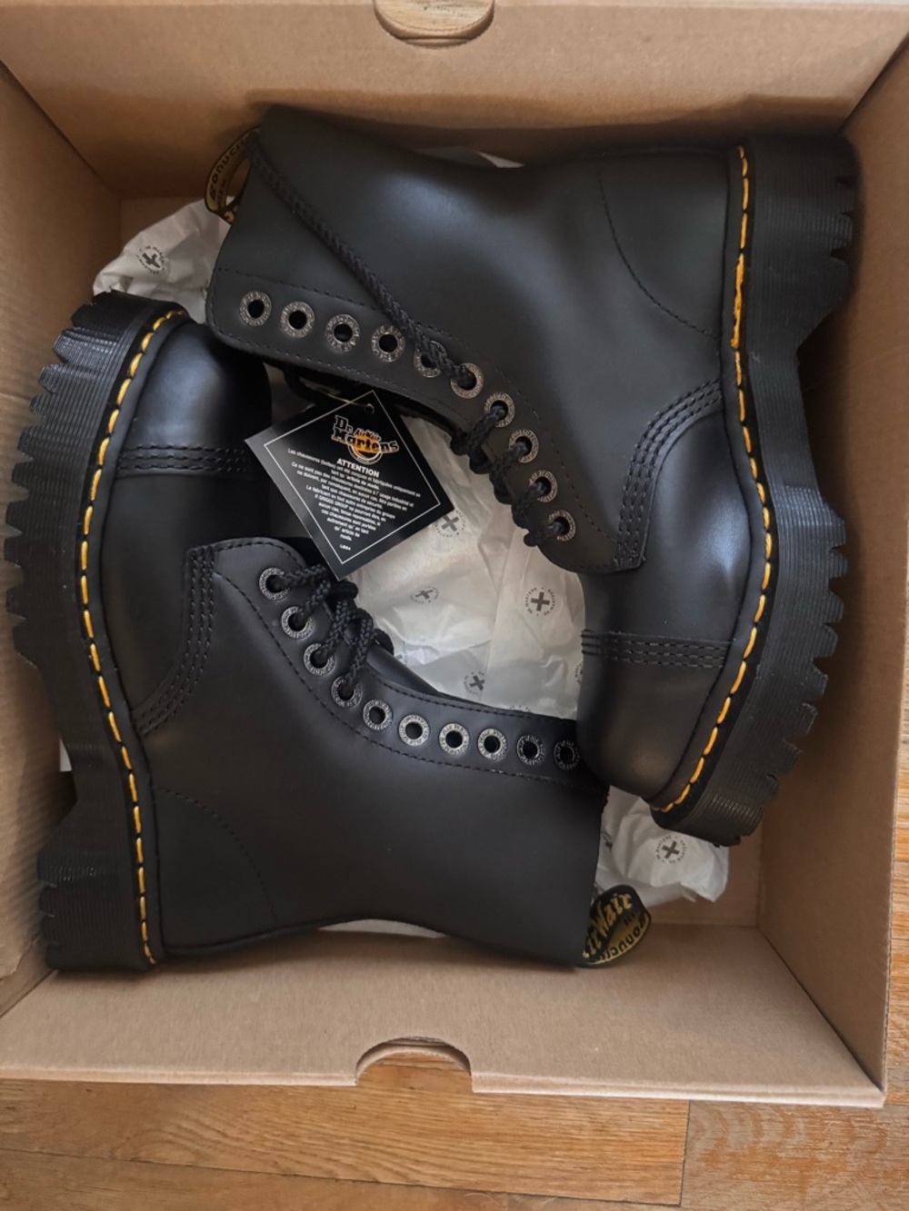 Dr. Martens Black Smooth Leather 8-Eye Combat Boots with Yellow Stitching